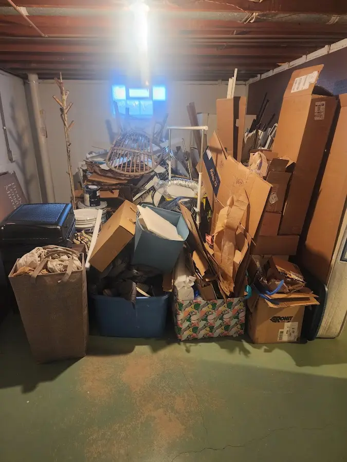 Roll-off dumpster container at job site for 15 Yard Dumpster Rental in Towson